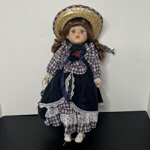 Porcelain Doll with Brown Hair Blue Eyes Straw Hat Blue Red Yellow White Dress